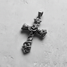 Silver rose cross pendant with an oxidized finish, showcasing the central rose and vine details on a light gray background.