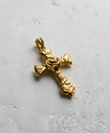 Gold-plated version of the rose cross pendant, displaying the warm polished finish and intricate floral vine design.
