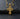 Gold vermeil Silver Jesus Face Pendant displaying detailed crown of thorns on dark slate background