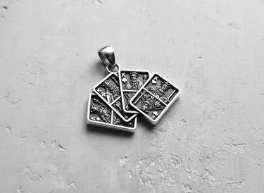 Angled view of the 925 sterling silver Four Kings Pendant, highlighting the oxidized finish and intricate royal details.