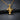 Gold vermeil praying hands cross pendant with polished finish displayed on black slate background