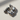 Bicep Dumbbell Pendant, oxidized silver, top angle product photo