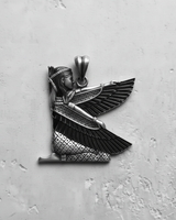 Top-down view of the sterling silver Isis pendant, showcasing the oxidized details on the wings and headdress.