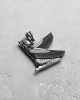 Angled view of the 925 sterling silver Isis pendant, highlighting the three-dimensional craftsmanship and oxidized details on the wings.