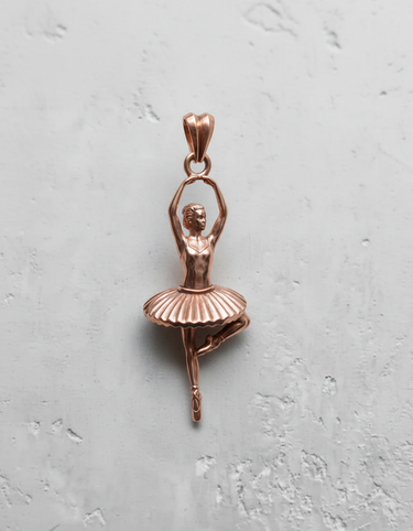 Rose gold plated silver ballerina pendant featuring a graceful dancer figure, perfect as a gift for ballet enthusiasts.