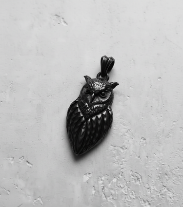 Black rhodium plated Silver Owl Pendant with a dark, moody finish, highlighting the depth of the sculpted design.