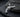 Polished 925 sterling silver revolver pendant featuring realistic cylinder and barrel details on dark stone background