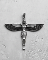 Front view of a sterling silver Winged Goddess Pendant with an oxidized finish, showing detailed feathers on a grey surface.