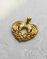 Gold plated version of the Silver Celtic Horse Pendant, showcasing the polished finish and design on a light gray background.