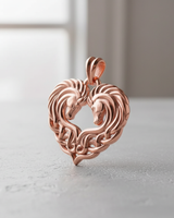 Rose gold Celtic horse heart pendant standing upright, showcasing its warm metallic tone and detailed craftsmanship.