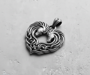 Oxidized 925 sterling silver Celtic horse heart pendant, a desaturated photo highlighting deep shadows and craftsmanship.