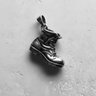 Oxidized 925 sterling silver combat boot pendant side profile with realistic stitching and dark finish