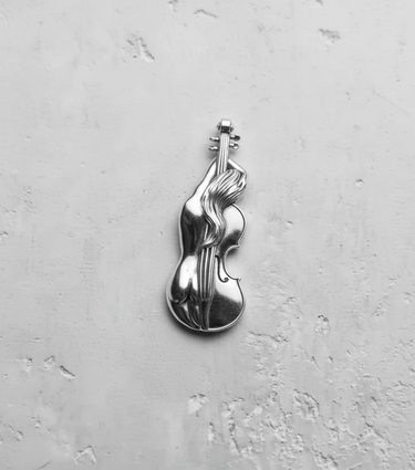 Silver Violin Nude Pendant in 925 sterling silver, top-down view showing the polished finish and artistic female form detail.