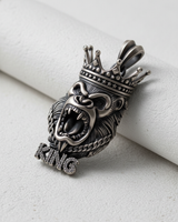 Silver Gorilla Pendant featuring a roaring expression, detailed crown, and iced-out KING lettering on a white background.