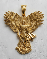 14K gold vermeil Archangel Michael pendant displaying winged figure slaying dragon with sword and shield