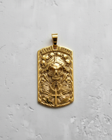 Gold vermeil Santa Muerte dog tag pendant with skull and rosary details on grey background