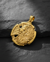 14K gold vermeil lion cross pendant with a detailed lion head and interwoven Celtic cross on a dark slate surface.
