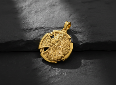 14K gold vermeil lion cross pendant with a detailed lion head and interwoven Celtic cross on a dark slate surface.