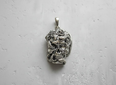 Close-up of the 925 sterling silver skull snake pendant, highlighting the intricate snake scales and rose petals.