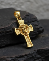 14K gold vermeil Jesus cross pendant with INRI inscription and crown of thorns detail, displayed on a dark stone surface.