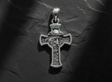 Close-up of the handcrafted 925 sterling silver Jesus cross pendant, highlighting the intricate face and thorn details.