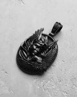 Dark oxidized 925 sterling silver Valkyrie pendant featuring a winged warrior helmet and eagle profile on textured background