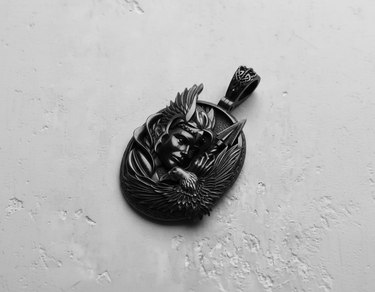 Dark oxidized 925 sterling silver Valkyrie pendant featuring a winged warrior helmet and eagle profile on textured background