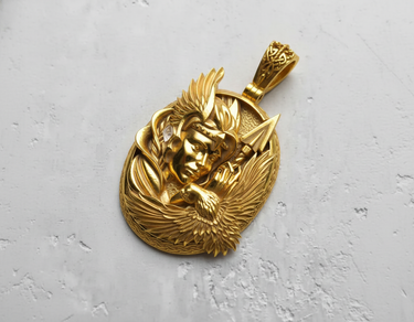 14K gold vermeil over silver Valkyrie pendant featuring winged helmet and eagle detail on white background