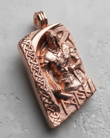 Rose gold-plated Viking warrior pendant angled to show the intricate craftsmanship of the Celtic and runic symbols.