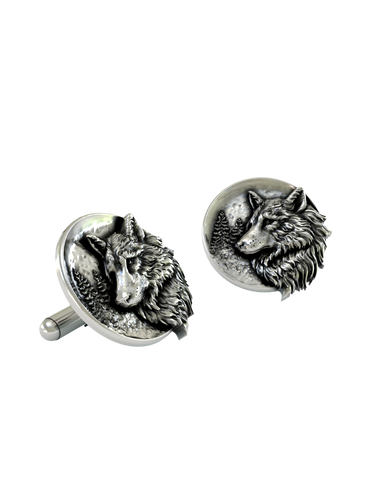 A macro close-up of a Silver Wolf Cufflink, highlighting the intricate fur texture and the detailed forest and moon background.