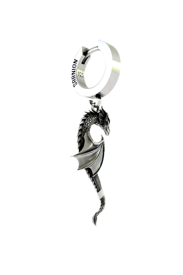 A person wearing the 925 sterling silver Dragon Wing Earring as a bold statement of their love for fantasy and myth.