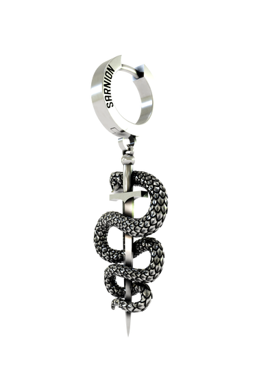 A person wearing the 925 sterling silver Serpent Sword Earring as a bold, symbolic statement piece.