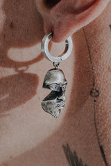 Abstract Face Earring in 925 sterling silver - front view showcasing the unique fractured portrait design.