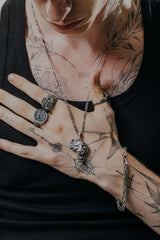 African Lion Pendant shown on a model to demonstrate its size and how it wears as a necklace