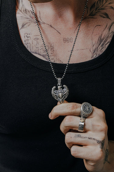 American Eagle Pendant shown on a model to demonstrate its size and how it wears as a statement necklace