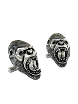 An extreme close-up of a Silver Gorilla Cufflink, emphasizing the intricate fur texture, polished teeth, and expert craftsmanship.