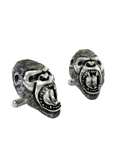 An extreme close-up of a Silver Gorilla Cufflink, emphasizing the intricate fur texture, polished teeth, and expert craftsmanship.