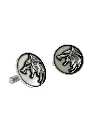 An extreme close-up of a Witcher Wolf Cufflink, highlighting the sharp, stylized details of the wolf's head.