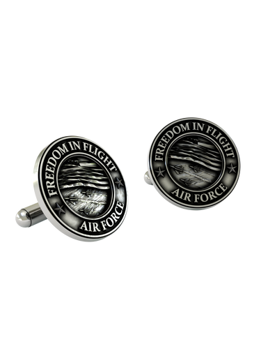 An extreme close-up of an Air Force Cufflink, emphasizing the fine details of the jets and the bold, clear lettering.