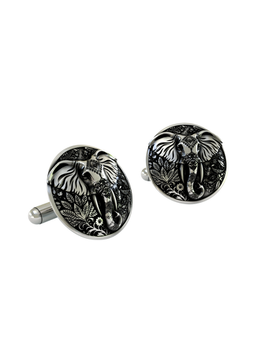 An extreme close-up of an Ornate Elephant Cufflink, emphasizing the fine, henna-like patterns on the elephant's head and trunk.