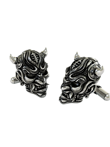 Angled view of the Samurai Oni mask sterling silver cufflinks pair, highlighting the intricate layers and oxidized details on the armor.