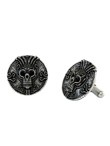Aztec Skull Warrior 925 sterling silver cufflinks - angled pair view showcasing the intricate headdress and Mesoamerican scrollwork.