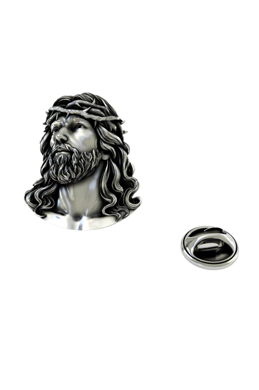 Back of the Silver Jesus Head Pin showing the pin post and the separate butterfly clutch backing.