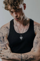 Back view of the American Eagle Pendant displaying the solid silver construction and ornate bail