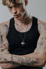 Back view of the Cat School Pendant showcasing the textured scale pattern and the SARNION 925 hallmark