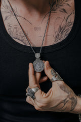 Back view of the Divine Protection Pendant featuring the Guardian Angel encircled by the Cyrillic Jesus Prayer.