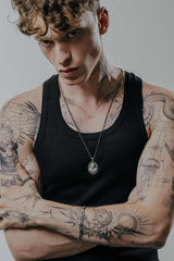 Back view of the Gentleman Bear Pendant showing the solid silver construction and the unique frame design.