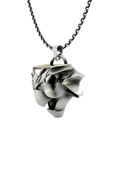 Back view of the Griffin School Pendant showcasing the solid silver construction and unique geometric facets.