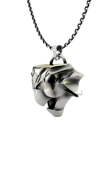 Back view of the Griffin School Pendant showcasing the solid silver construction and unique geometric facets.