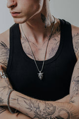 Back view of the Oni Mask Pendant showing the intricate scale pattern and the SARNION 925 hallmark.